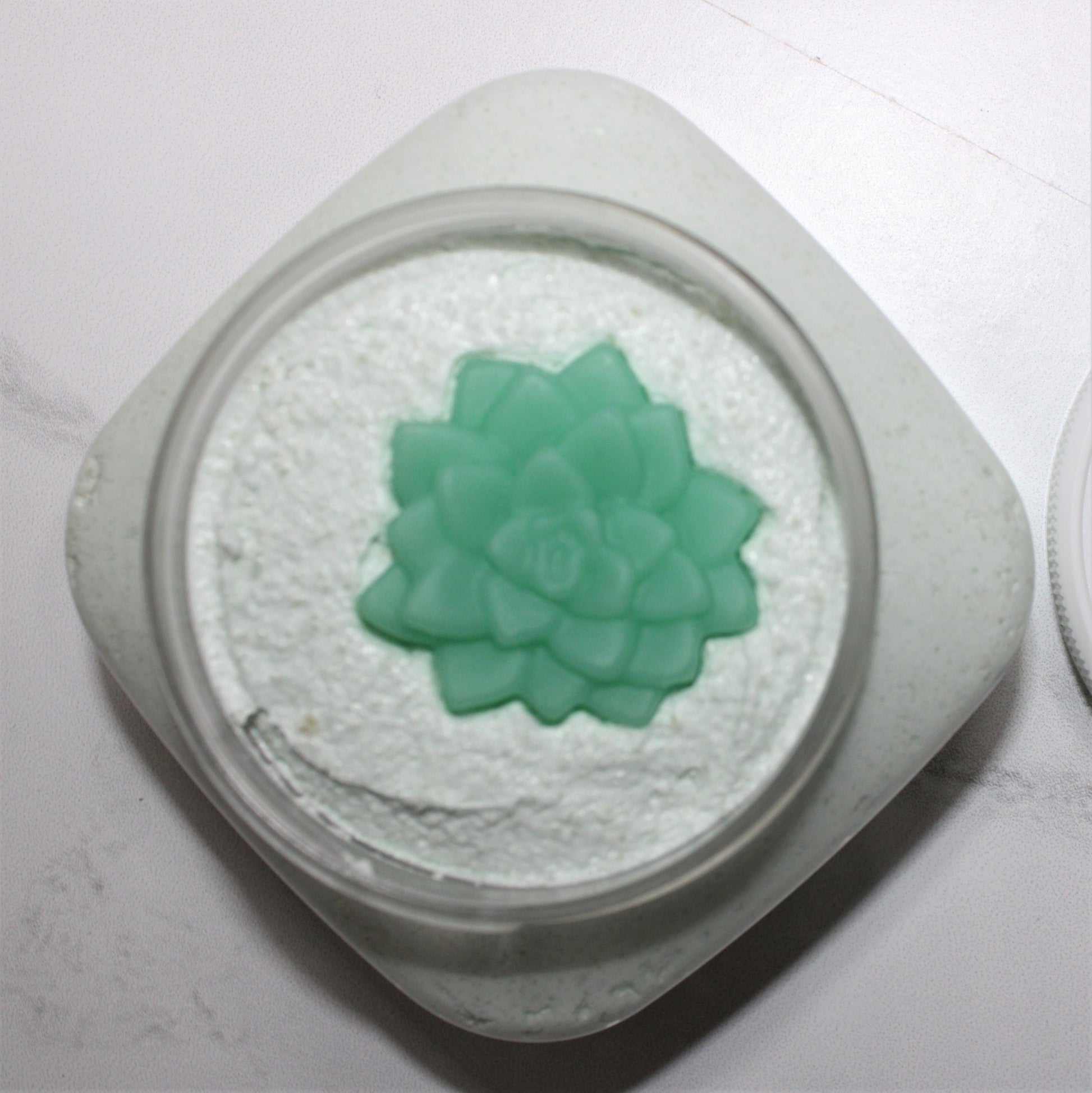 Open jar of Strebors Gardenia Whipped Sugar Scrub